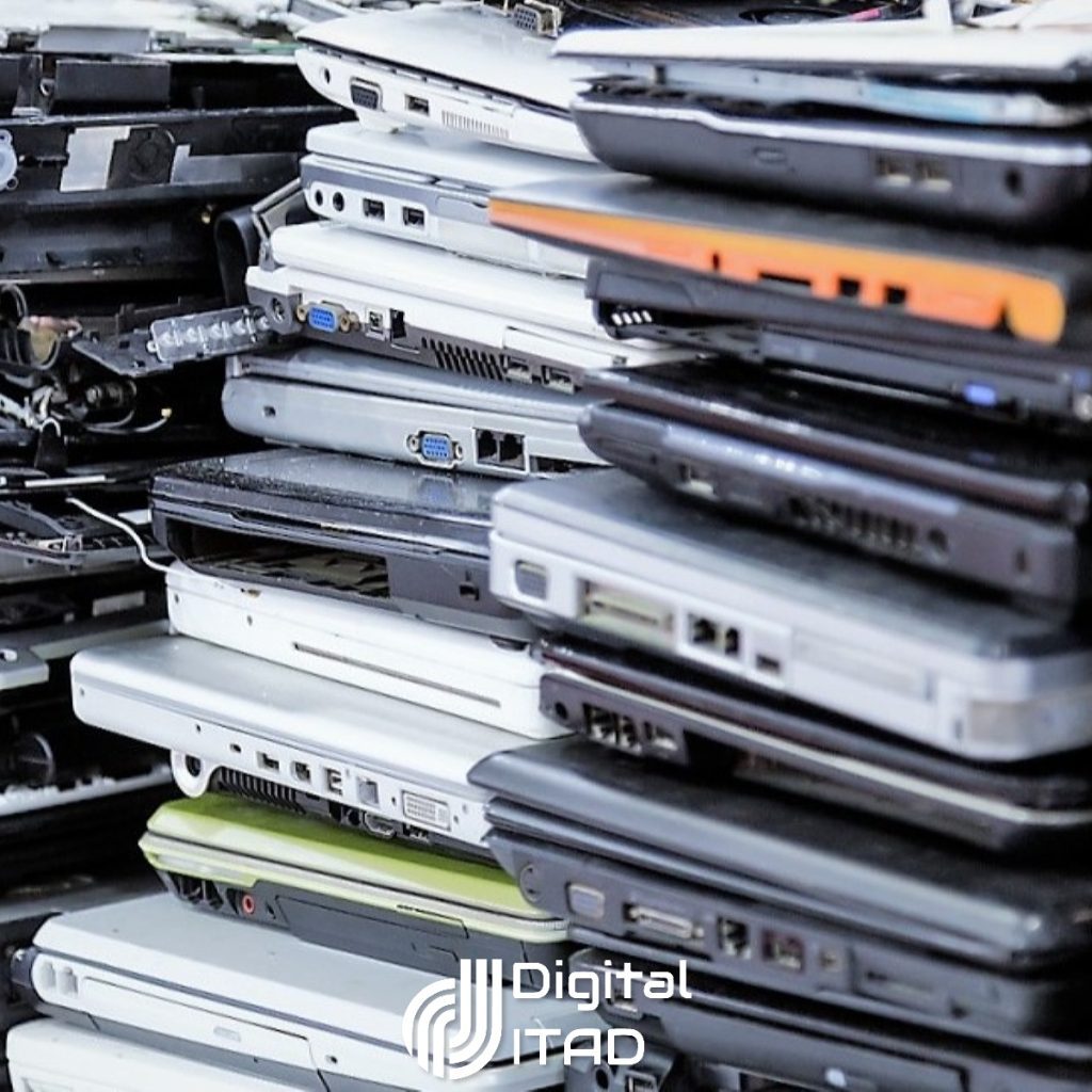 Stack of old, broken and obsolete laptop