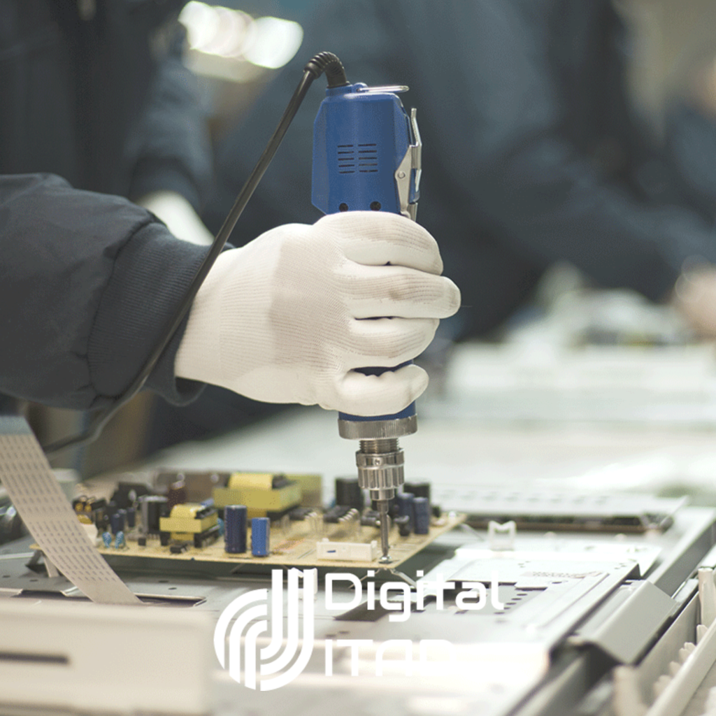 Worker in gloves using an electric screwdriver to assemble an electronic circuit